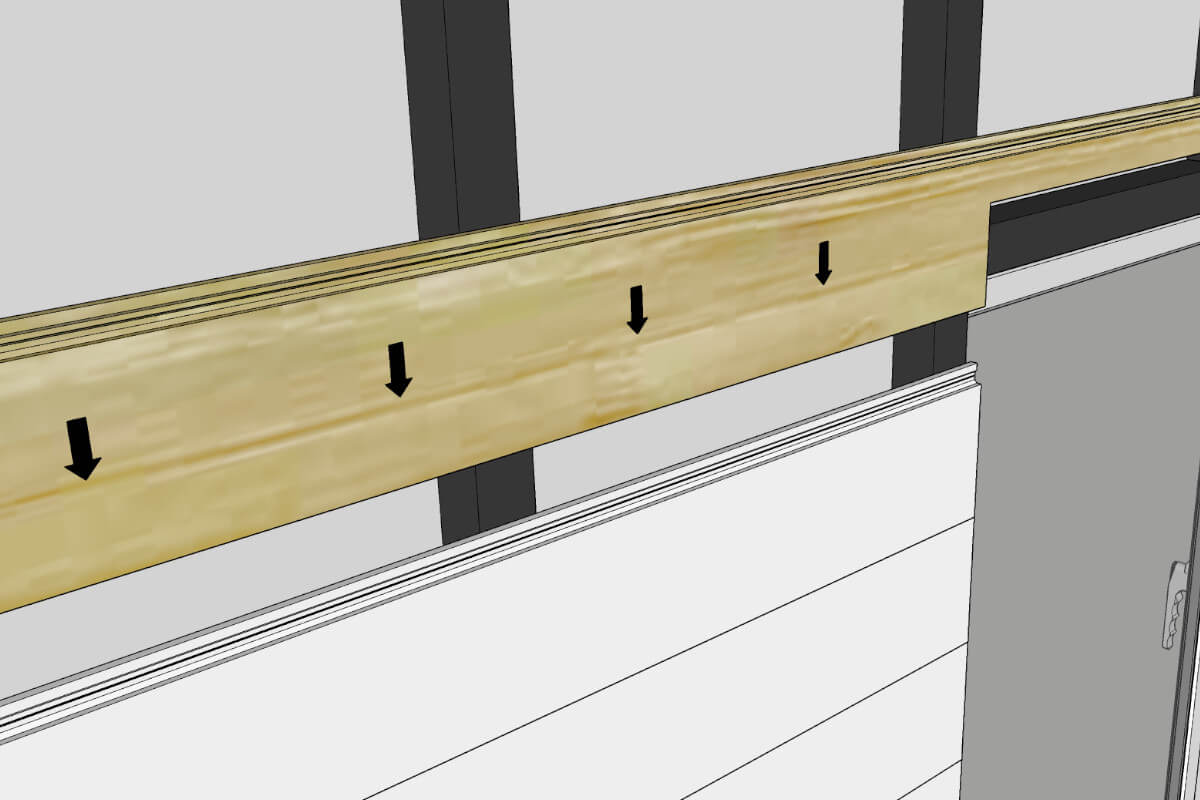 Installing a trimmed cladding board around a door